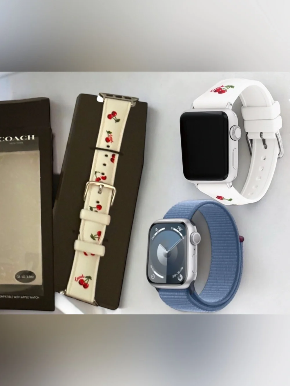 Apple Watch Series 9 Aluminum 41 mm w/ Blue Sport Loop & Coach Cherry Band 64 GB